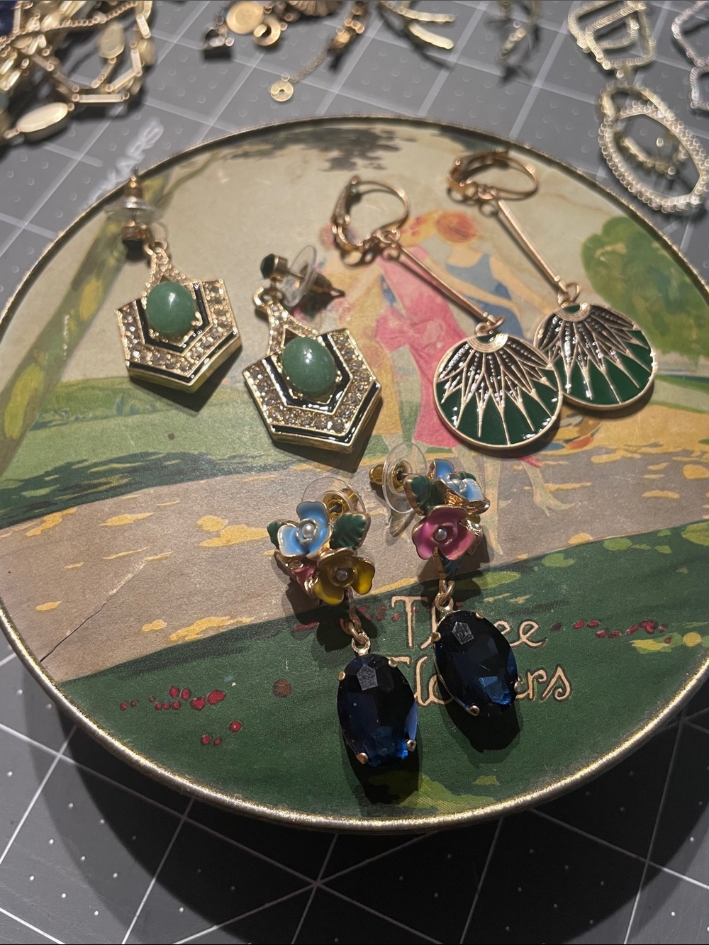 Three pairs of art deco style earrings